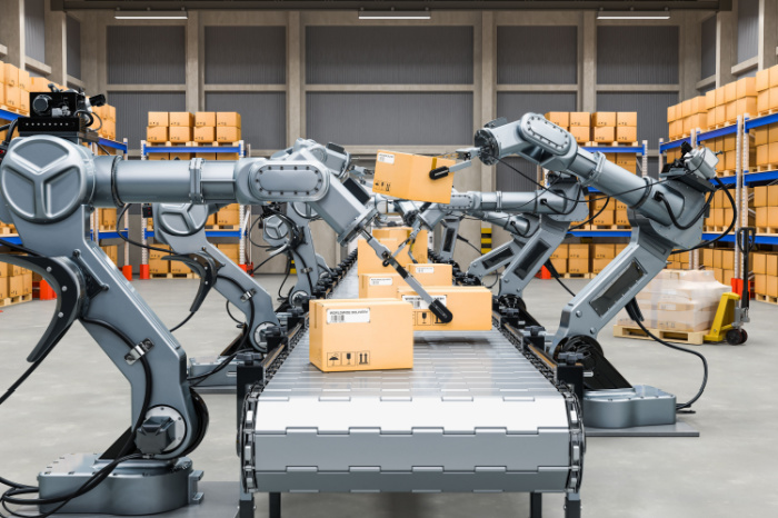 Roboterarme mit Pakete in Fabrik